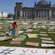 Activists with Greta Thunberg’s Fridays for Future movement stage a protest for the coronavirus era outside Germany’s Reichstag.